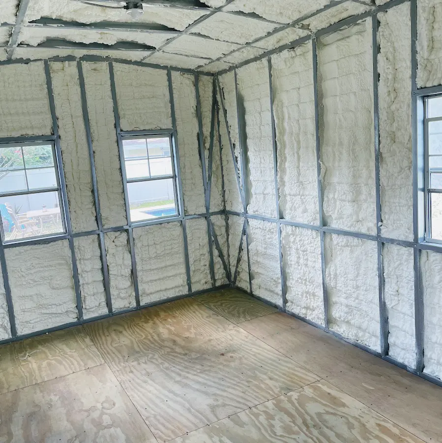 Closed-cell spray foam insulation applied to wall cavities in a residential project in Moss Point